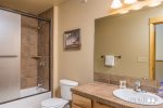 Upper Level Shared Remolded Bathroom with Tile Shower/Tub
